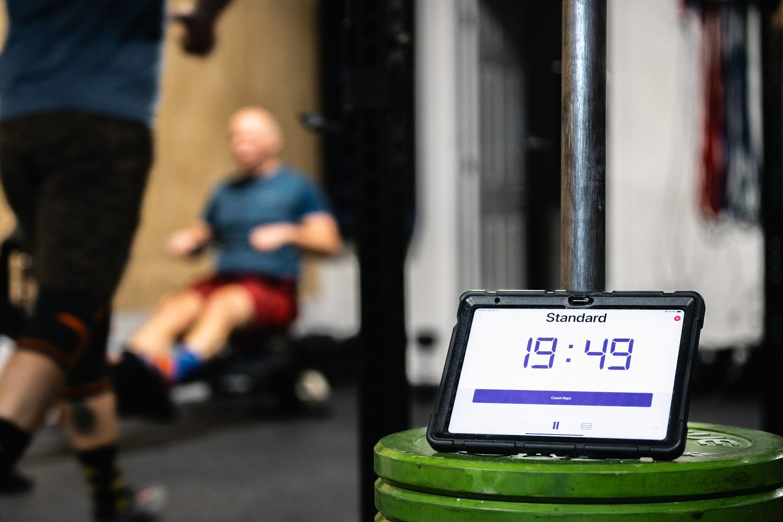 A workout timer in focus during conditioning at Surface Fit Athletics